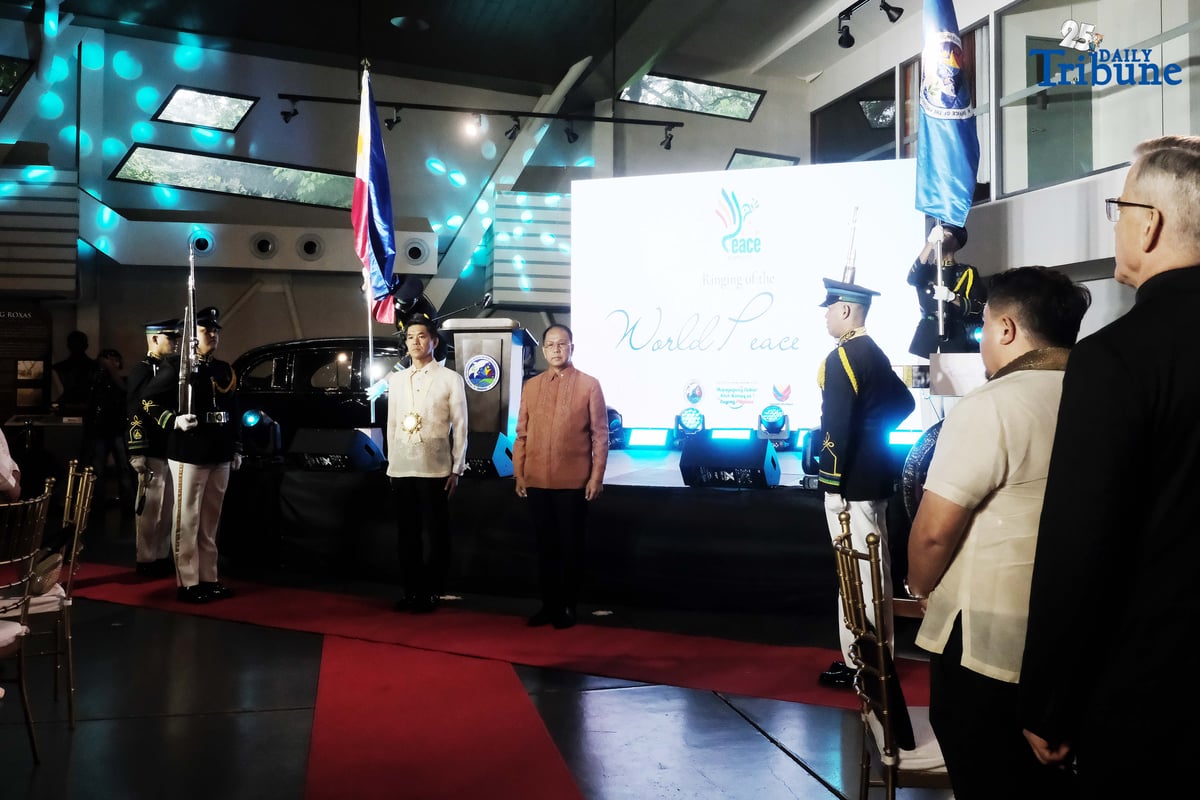As part of the National Peace Consciousness Month celebration, Presidential Adviser on Peace, Reconciliation and Unity Secretary Carlito Galvez Jr. and Japanese Ambassador to the Philippines Endo Kazuya lead the ceremonial ringing of the peace bell at the Presidential Car Museum in Quezon City on Monday