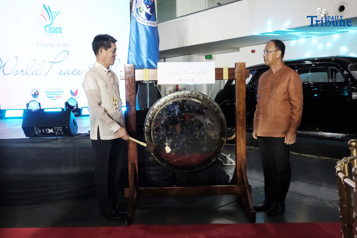 As part of the National Peace Consciousness Month celebration, Presidential Adviser on Peace, Reconciliation and Unity Secretary Carlito Galvez Jr. and Japanese Ambassador to the Philippines Endo Kazuya lead the ceremonial ringing of the peace bell at the Presidential Car Museum in Quezon City on Monday