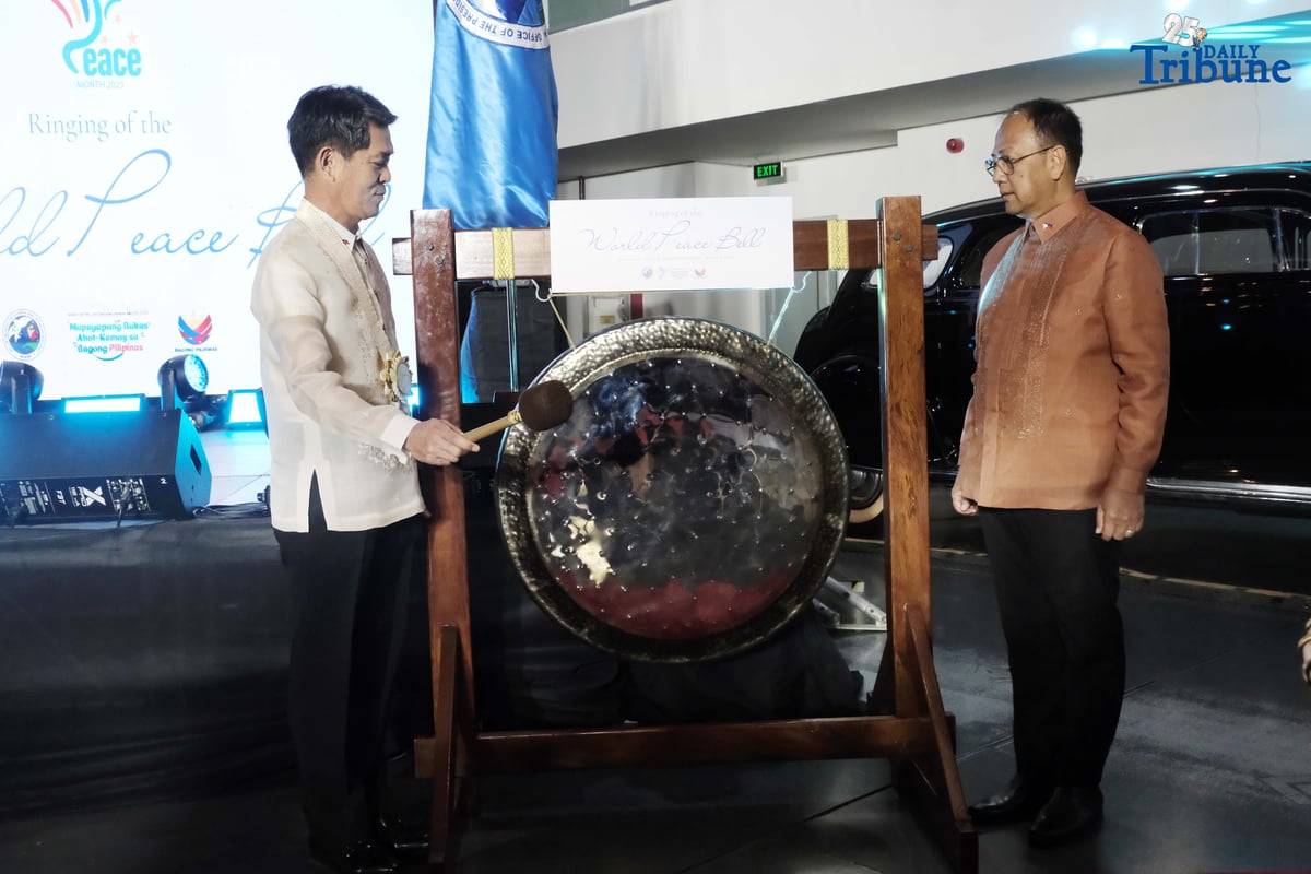 As part of the National Peace Consciousness Month celebration, Presidential Adviser on Peace, Reconciliation and Unity Secretary Carlito Galvez Jr. and Japanese Ambassador to the Philippines Endo Kazuya lead the ceremonial ringing of the peace bell at the Presidential Car Museum in Quezon City on Monday