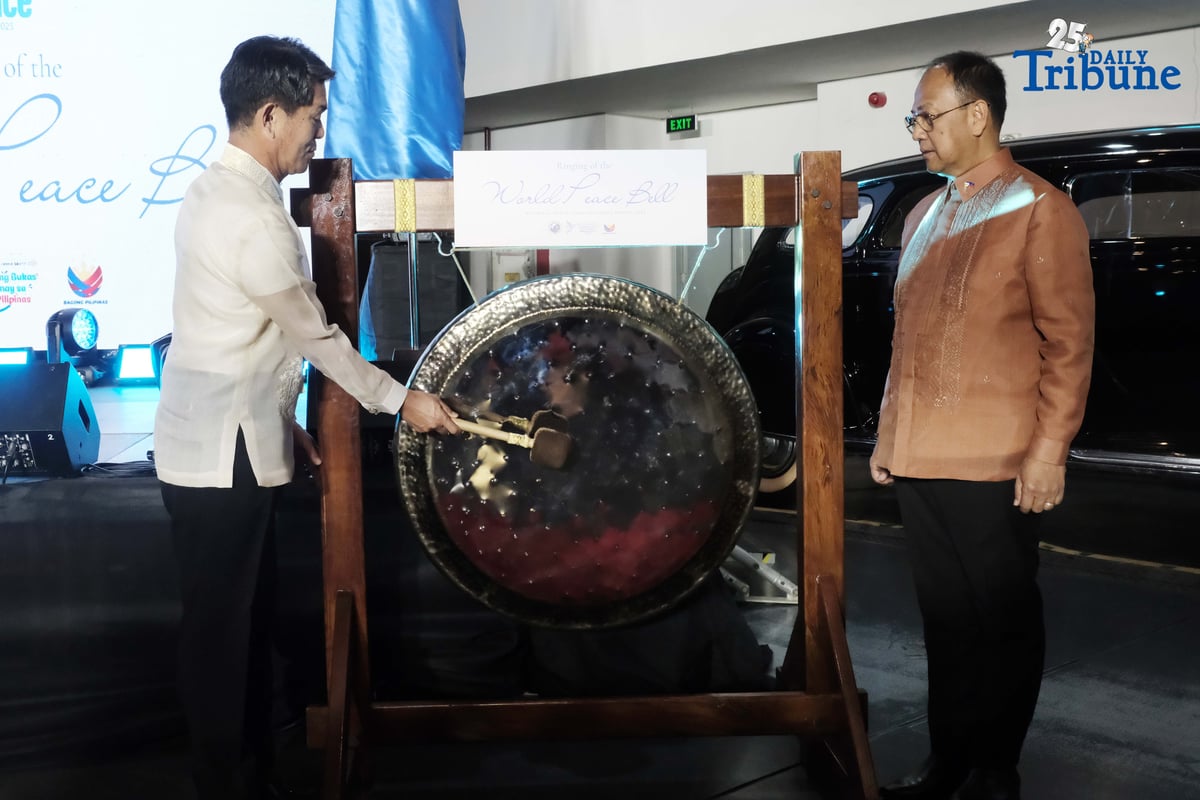 As part of the National Peace Consciousness Month celebration, Presidential Adviser on Peace, Reconciliation and Unity Secretary Carlito Galvez Jr. and Japanese Ambassador to the Philippines Endo Kazuya lead the ceremonial ringing of the peace bell at the Presidential Car Museum in Quezon City on Monday