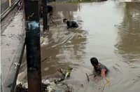 SEVERAL houses along the Matubig Creek in Barangay San Agustin of this town are in danger of being swept away by raging currents as a portion of the earth dike collapsed on Monday morning.