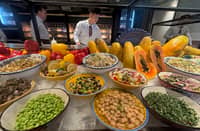 A feast beyond the fire — Market Table brims with vibrant salads, artisanal charcuterie, rich cheeses, smoked salmon, fresh fruits and leafy greens. A colorful celebration of freshness to balance the bold flavors of churrasco.