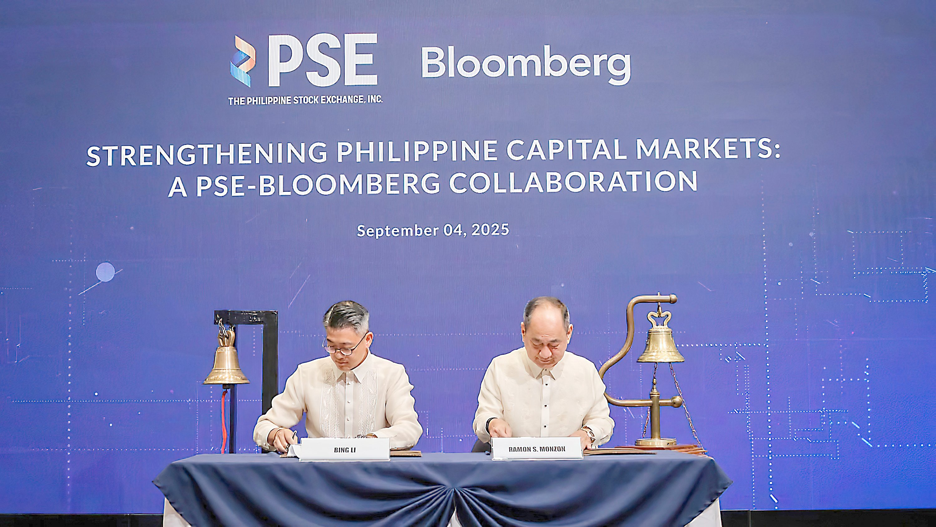Bloomberg APAC head of sales Bing Li (left) and PSE president and CEO Ramon S. Monzon sign a Letter of Intent to formalize a partnership boosting the local capital market.