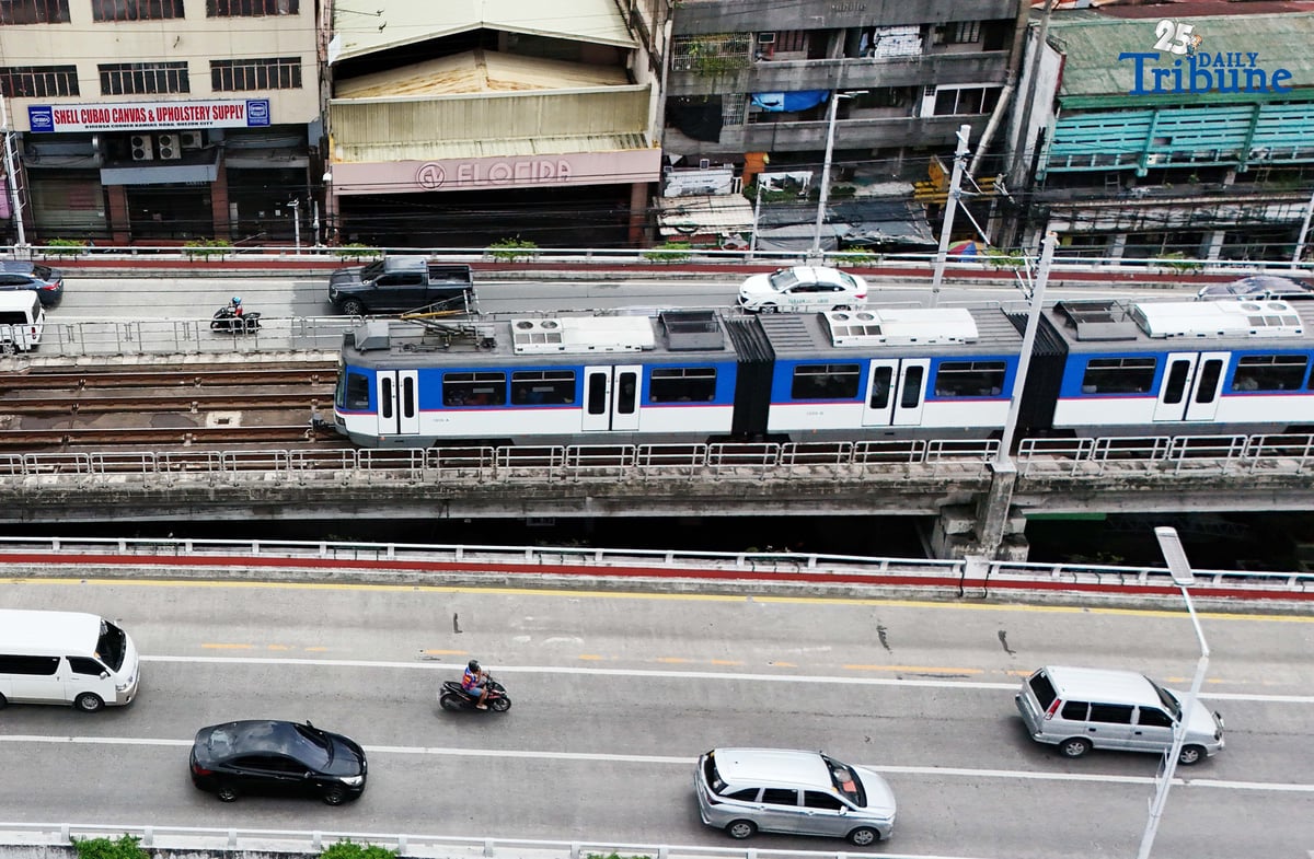 An MRT-3 train passes through Quezon City on Thursday. The Department of Transportation announced that student Beep cards will be available starting September 15, automatically giving passengers a 50 percent fare discount. The cards, valid for one year, can be claimed at MRT and LRT stations upon presentation of a valid school ID or registration, with dedicated printing booths set up in each station.