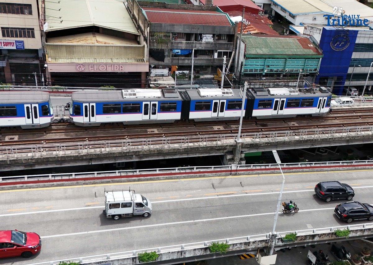 An MRT-3 train passes through Quezon City on Thursday. The Department of Transportation announced that student Beep cards will be available starting September 15, automatically giving passengers a 50 percent fare discount. The cards, valid for one year, can be claimed at MRT and LRT stations upon presentation of a valid school ID or registration, with dedicated printing booths set up in each station.