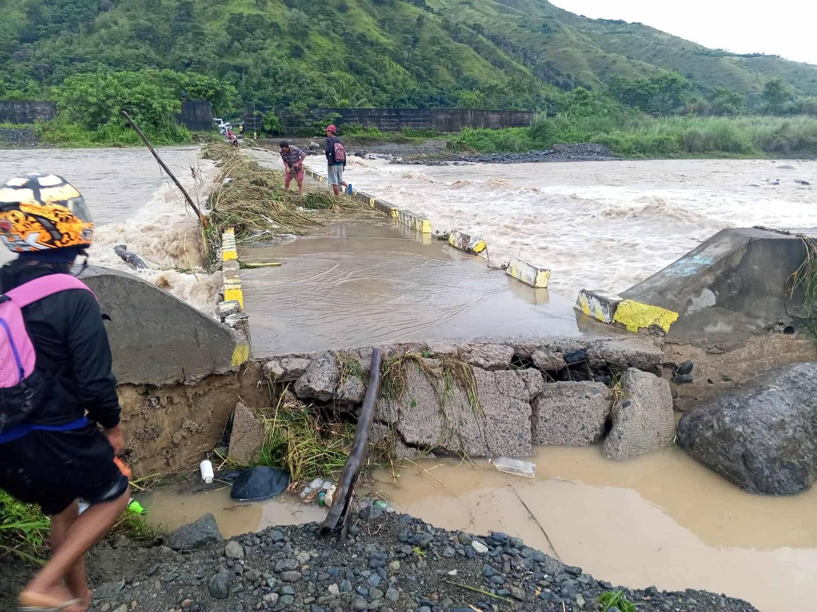 An overflow bridge in Barangay Calitlitan, Aritao Nueva Vizcaya together as destroyed by strong river currents in the morning of September 5, 2025. The bridge is now passable due to quick response of the barangay LGU personnel of Calitlitan and Balite barangays together with local quarry operators who put temporary repairs on the infrastructure. #| Aldwin Quitasol. Photo Courtesy of MDRRMO Aritao