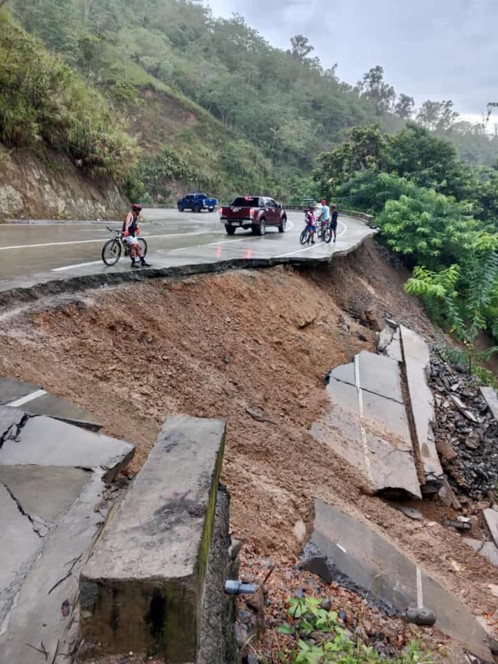 In the morning of September 5, 2025, a jeep loaded with tomatoes fell after a portion of the Benguet-Nueva Vizcaya Road collapsed. Photo Courtesy of MDRRMO Aritao