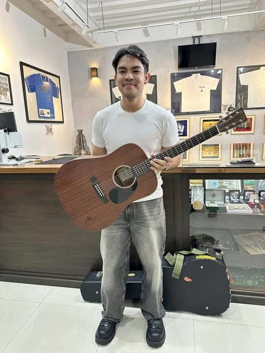 Jason Marvin and his treasured guitar