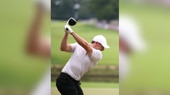 McIlroy surges into contention
