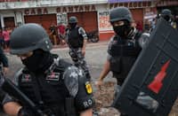 Masked gang kills boys
