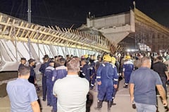 Two die after bridge collapses