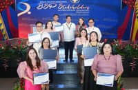 MONETARY Board Member Jose Querubin (top row, center) and Bangko Sentral ng Pilipinas (BSP) Deputy Governor Bernadette Romulo-Puyat (top row, right) led the ceremony on the recognition of outstanding partners of the BSP Mindanao Regional Office on 8 September in Butuan City.