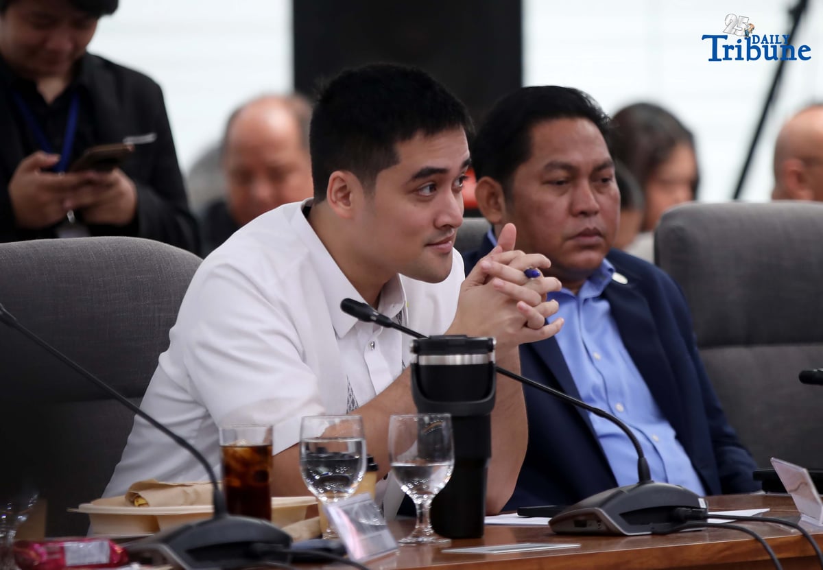 Former DPWH Bulacan 1st District Engineer Brice Ericson Hernandez and former Assistant Engineer JP Mendoza present a photo of Sen. Jinggoy Estrada and a text message from Sen. Joel Villanueva during the House infrastructure committee hearing on alleged flood control anomalies, Tuesday, September 9, 2025. Also in attendance were DPWH officials, contractors, and Pasig City Mayor Vico Sotto.