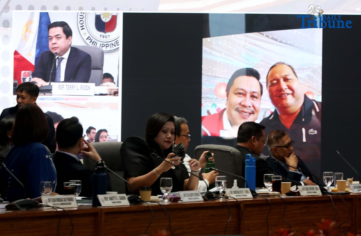 Former DPWH Bulacan 1st District Engineer Brice Ericson Hernandez and former Assistant Engineer JP Mendoza present a photo of Sen. Jinggoy Estrada and a text message from Sen. Joel Villanueva during the House infrastructure committee hearing on alleged flood control anomalies, Tuesday, September 9, 2025. Also in attendance were DPWH officials, contractors, and Pasig City Mayor Vico Sotto.