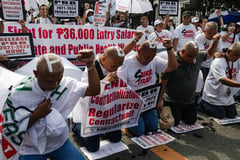 Health workers shave heads in protest over delayed bonuses
