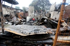 Quezon City blaze leaves residents picking through ruins of homes