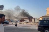 Smoke billows after explosions in Qatar’s capital Doha on Wednesday.