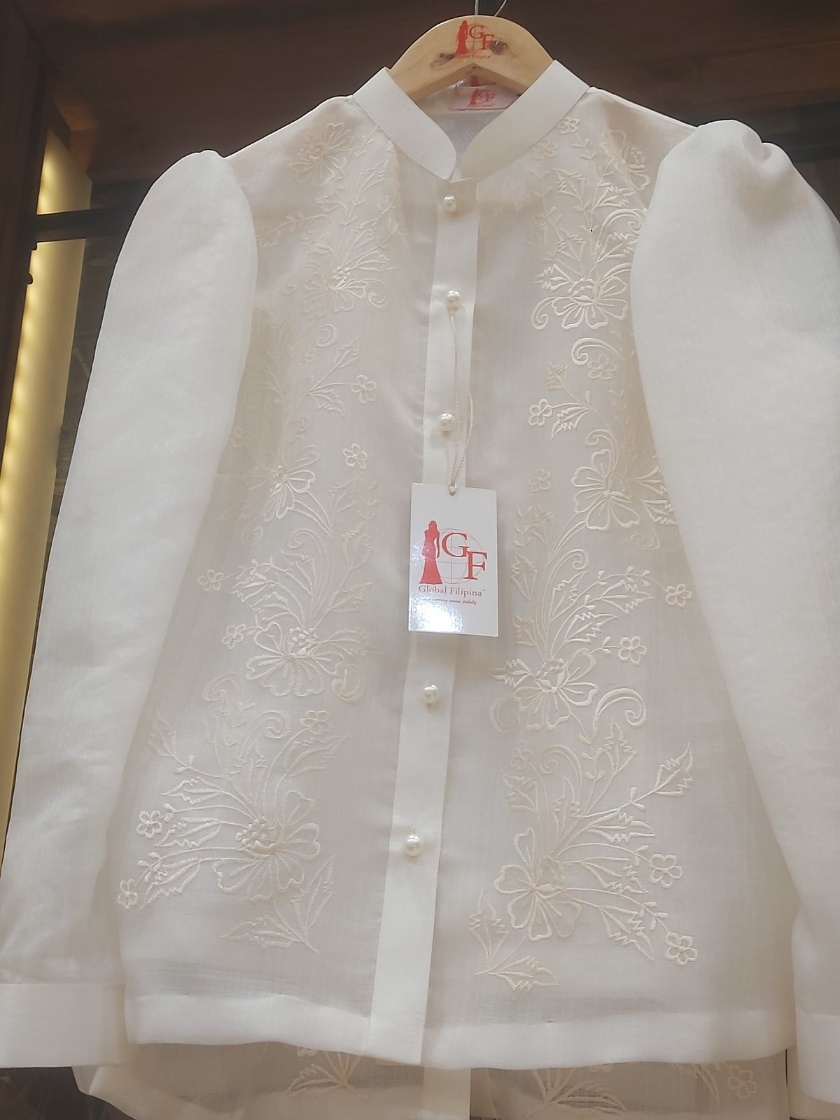 Pearls embroidered into barong Tagalog.