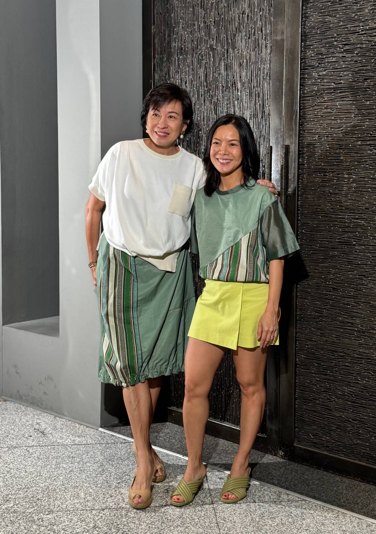 Jeannie Javelosa and Charito ‘Yoya’ Gueco-Verdier each using a Co-Create YOYA x Great Women Textiles (in this photo, textiles accents from Marawi).