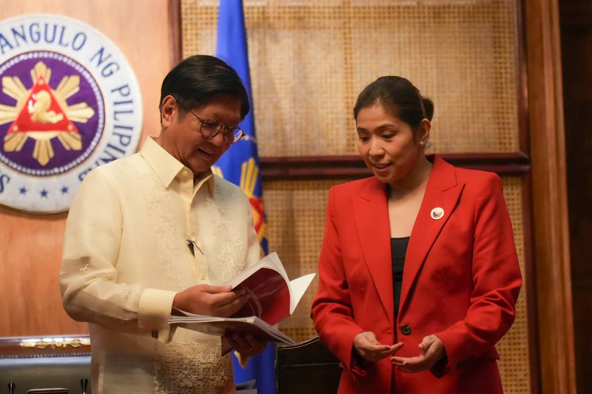 DBM Secretary Amenah F. Pangandaman presents to President Ferdinand R. Marcos Jr. the copy of the National Expenditure Program for Fiscal Year 2026 in Malacañang on 12 August.