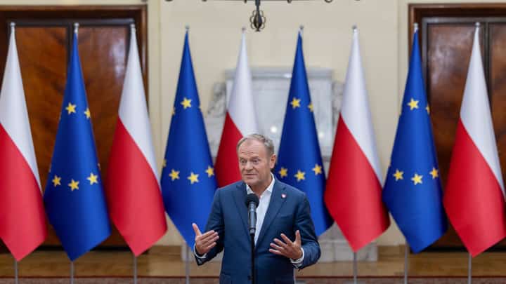 Poland's Prime Ministrer Donald Tusk arrives to address the late evening press conference in the government building after he attended in the National Security Council convened by Poland's President at the Presidential Palace in Warsaw on September 11, 2025, a day after Warsaw accused Moscow of carrying out a drone raid on its territory. France and Germany moved to bolster defence of Polish airspace on September 11 as the UN Security Council called an emergency meeting to discuss Warsaw's accusation that Moscow launched a drone raid on its territory. Poland branded the incident, which prompted Polish and NATO forces to shoot down several drones overnight Tuesday to Wednesday, September 9-10, a deliberate "unprecedented" attack on the country, NATO and the European Union.