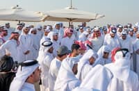 This handout picture made available by the Qatar Amiri Diwan, shows Qatar's Emir Sheikh Tamim bin Hamad Al-Thani attending the funeral of people killed in an Israeli strike on figures of the Palestinain Hamas movement two days earlier, at the Mesaimeer cemetery in Doha on 11 September 2025. On 9 September, Israel struck Doha targeting Hamas leaders, but the group said its top officials survived, while five of its members were left dead and a Qatari security force member was also killed. In an interview with CNN the following day, Qatar's Prime Minister said he hoped for a collective regional response to the attack and that an Arab-Islamic summit would be held in Doha to decide on a course of action.