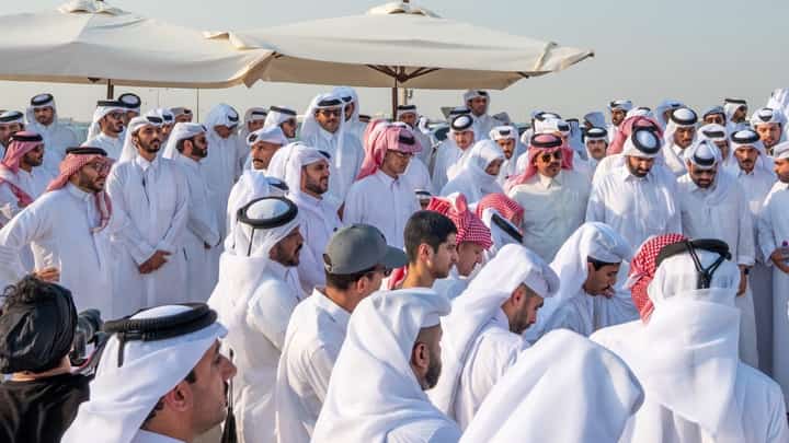 This handout picture made available by the Qatar Amiri Diwan, shows Qatar's Emir Sheikh Tamim bin Hamad Al-Thani attending the funeral of people killed in an Israeli strike on figures of the Palestinain Hamas movement two days earlier, at the Mesaimeer cemetery in Doha on 11 September 2025. On 9 September, Israel struck Doha targeting Hamas leaders, but the group said its top officials survived, while five of its members were left dead and a Qatari security force member was also killed. In an interview with CNN the following day, Qatar's Prime Minister said he hoped for a collective regional response to the attack and that an Arab-Islamic summit would be held in Doha to decide on a course of action.