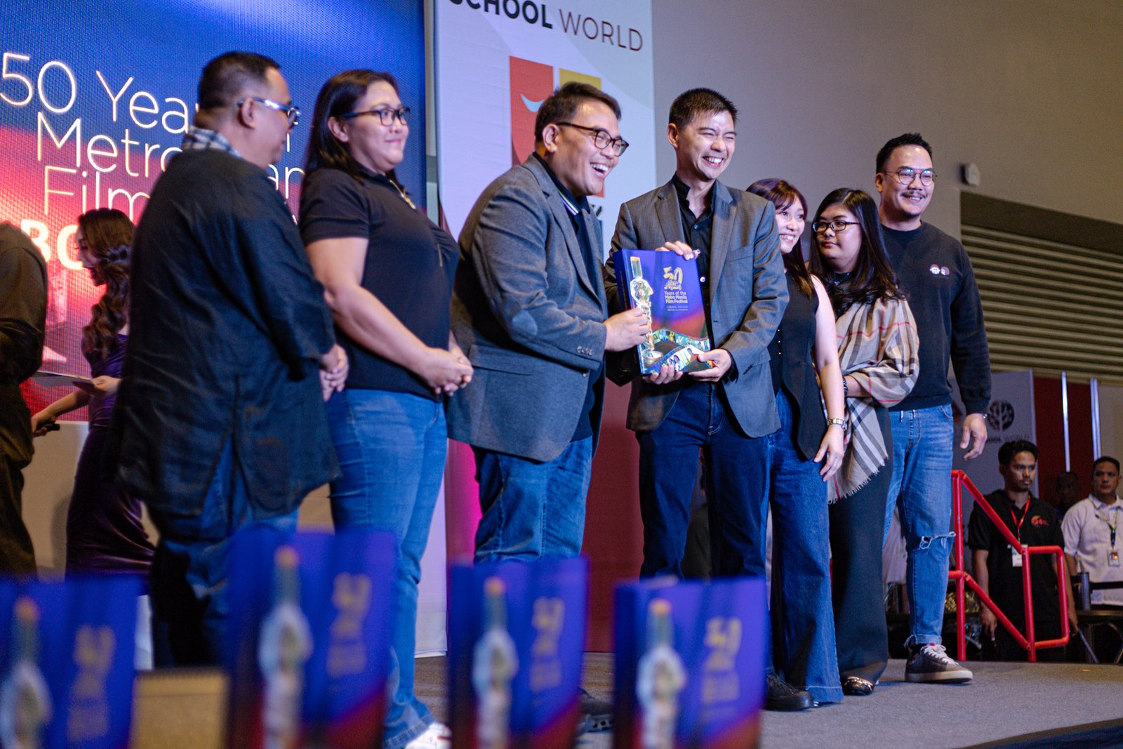 MMDA chair Atty. Don Artes formally receives the “50 Years of Metro Manila Festival” coffee table book from ABS-CBN Books president Mark Yambot during a turnover ceremony at the Manila International Book Fair 2025 in Pasay City on September 12. Multi-MMFF Best Actress winner Judy Ann Santos was also inducted into the MMFF Hall of Fame, the youngest in its 50-year history.
