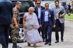 Nepal returns to calm as first woman PM takes charge, visits wounded