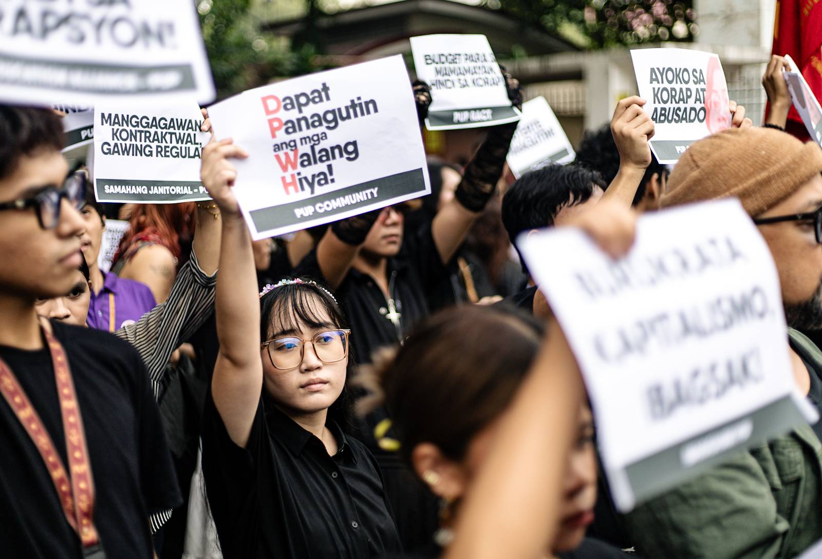 College students from Polytechnic University of the Philippines storm out of their classrooms to protest against the widespread corruption of the flood control projects under the Marcos Jr. administration, in Sta. Mesa, Manila on Monday, 15 September 2025.