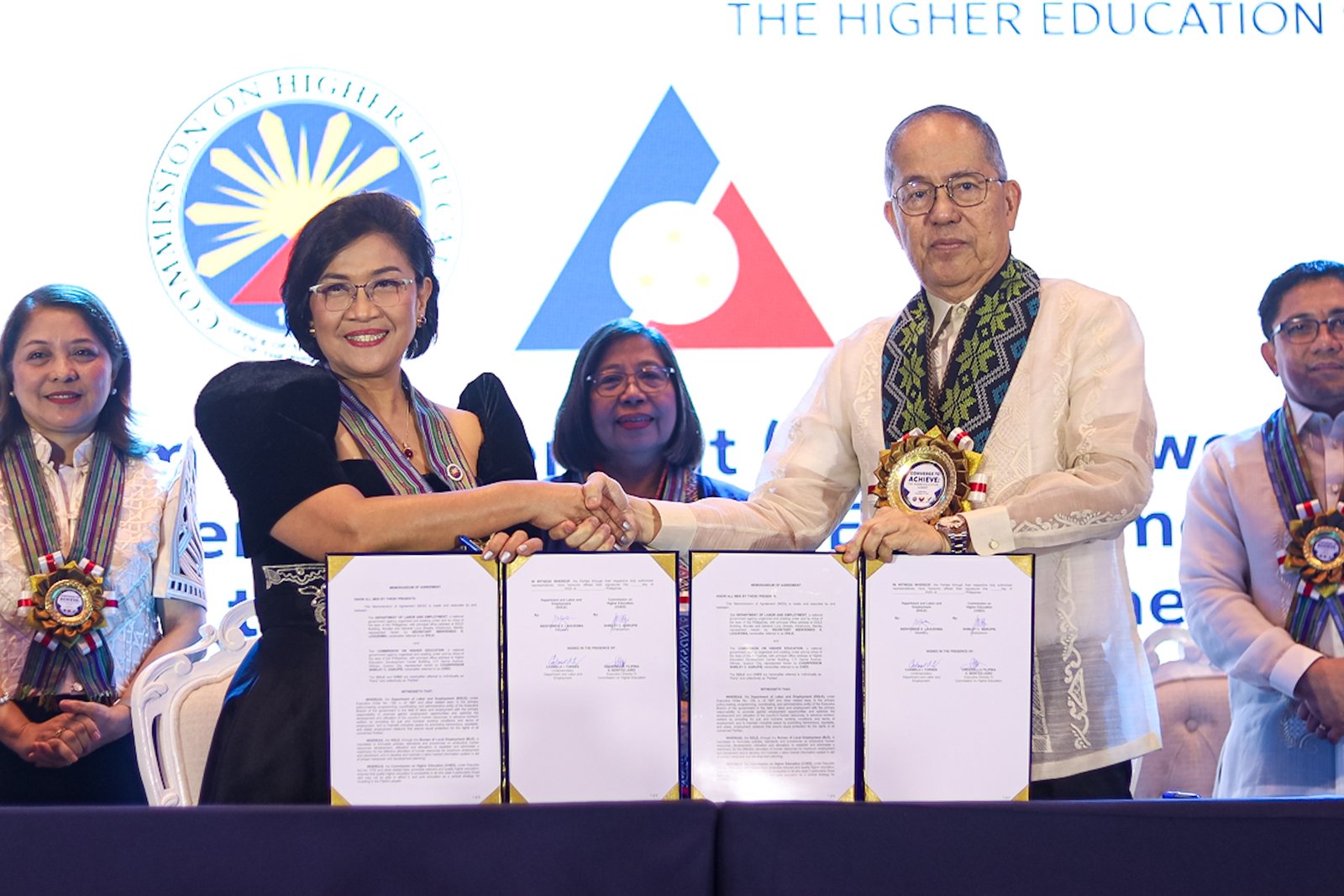 Commission on Higher Education (CHED) Chairperson Dr. Shirley Agrupis signs ACHIEVE partnership agreements with national agencies, including TESDA Secretary Kiko Benitez, Labor Secretary Bienvenido Laguesma, Migrant Workers Secretary Hans Leo Cacdac, and Commission on Human Rights Commissioner Monina Zenarosa, during the "Converge to ACHIEVE: The Higher Education Summit" at the Manila Hotel on Monday, 15 September 2025.

The event also marked Agrupis’ first 100 days as CHED chairperson. The agreements aim to improve and strengthen the country’s education system.