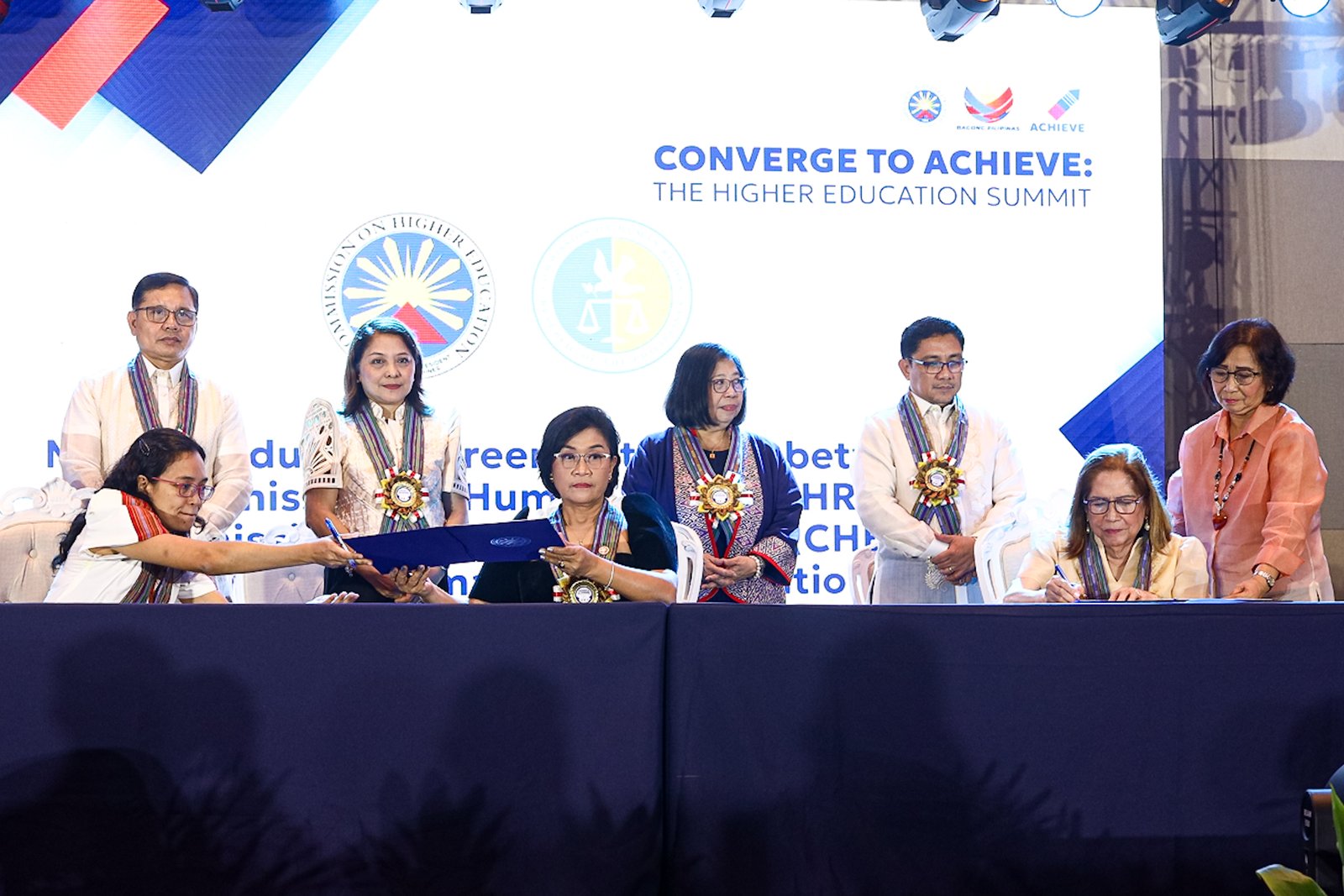 Commission on Higher Education (CHED) Chairperson Dr. Shirley Agrupis signs ACHIEVE partnership agreements with national agencies, including TESDA Secretary Kiko Benitez, Labor Secretary Bienvenido Laguesma, Migrant Workers Secretary Hans Leo Cacdac, and Commission on Human Rights Commissioner Monina Zenarosa, during the "Converge to ACHIEVE: The Higher Education Summit" at the Manila Hotel on Monday, 15 September 2025.

The event also marked Agrupis’ first 100 days as CHED chairperson. The agreements aim to improve and strengthen the country’s education system.