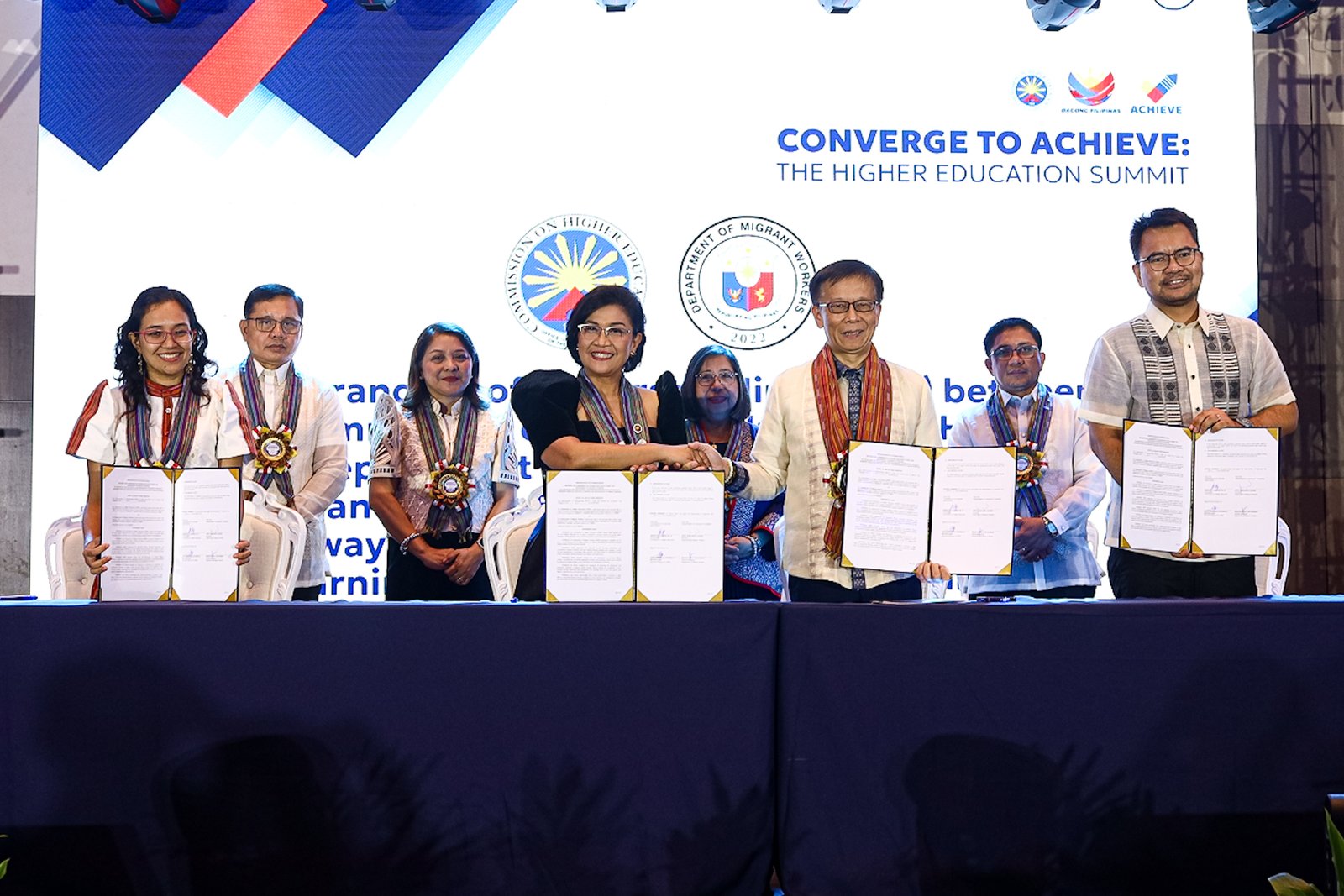 Commission on Higher Education (CHED) Chairperson Dr. Shirley Agrupis signs ACHIEVE partnership agreements with national agencies, including TESDA Secretary Kiko Benitez, Labor Secretary Bienvenido Laguesma, Migrant Workers Secretary Hans Leo Cacdac, and Commission on Human Rights Commissioner Monina Zenarosa, during the "Converge to ACHIEVE: The Higher Education Summit" at the Manila Hotel on Monday, 15 September 2025.

The event also marked Agrupis’ first 100 days as CHED chairperson. The agreements aim to improve and strengthen the country’s education system.