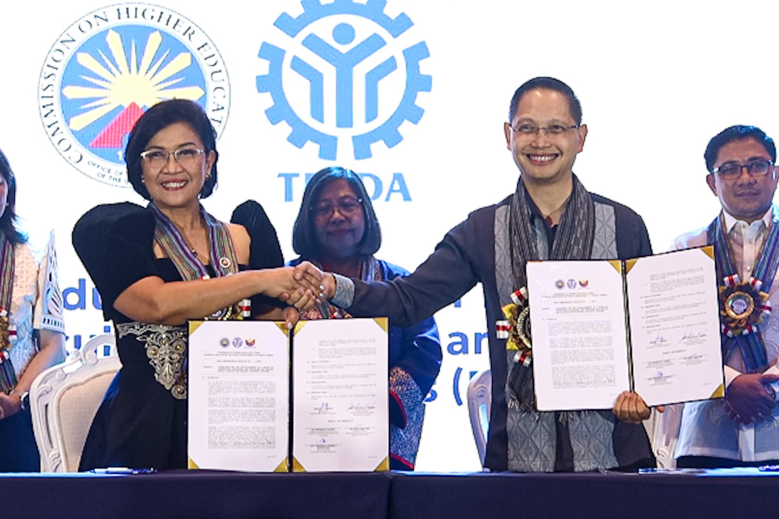 Commission on Higher Education (CHED) Chairperson Dr. Shirley Agrupis signs ACHIEVE partnership agreements with national agencies, including TESDA Secretary Kiko Benitez, Labor Secretary Bienvenido Laguesma, Migrant Workers Secretary Hans Leo Cacdac, and Commission on Human Rights Commissioner Monina Zenarosa, during the "Converge to ACHIEVE: The Higher Education Summit" at the Manila Hotel on Monday, 15 September 2025.

The event also marked Agrupis’ first 100 days as CHED chairperson. The agreements aim to improve and strengthen the country’s education system.
