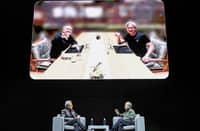 Nvidia CEO Jensen Huang (L) speaks with the CEO of the SoftBank Group Masayoshi Son during an AI event in Tokyo on November 13, 2024.
