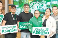 Grab Philippines Vice President for Cities CJ Lacsican, together with representatives from the Angeles City LGU, DICT, and the local merchant community, officially launched Grab Asenso: A Digital Diskarte Program. (From left) Kuya Jeck’s Tapsilogan owner Ronnie Casupanan, DICT Pampanga Provincial Head Engr. Jonathan Solis, Grab PH Regional Manager for Northern Luzon Joe Mangiliman, Angeles City Vice Mayor Amos Rivera, Grab PH Vice President for Cities CJ Lacsican, Morgen Kaffee owners Miguel and Micaela Evangelista, and Grab PH Country Communications Head Arvi Lopez.