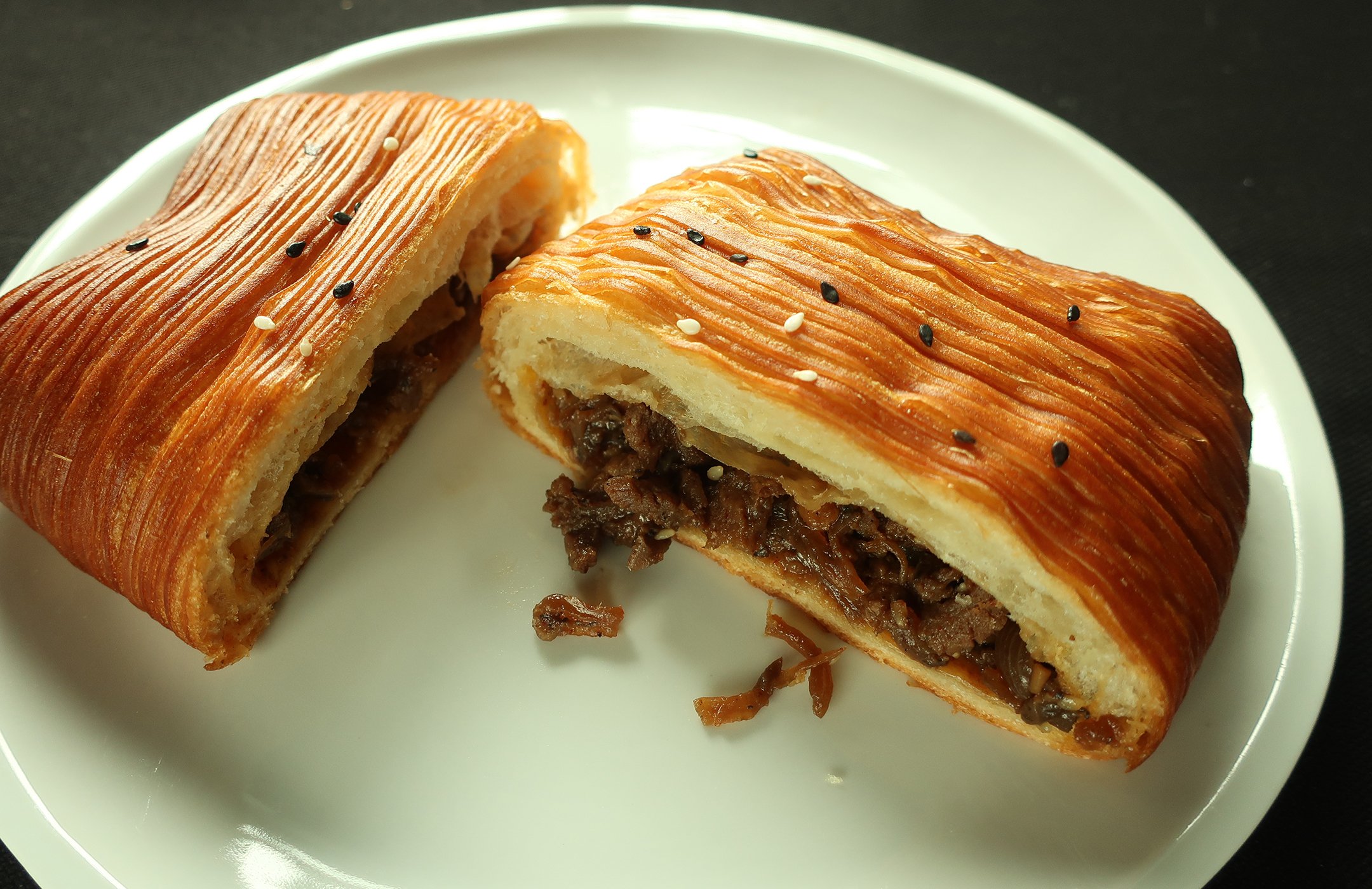 Masa Madre Bakehouse’s Beef Bulgogi Pain Suisse is loaded with luscious beef filling.