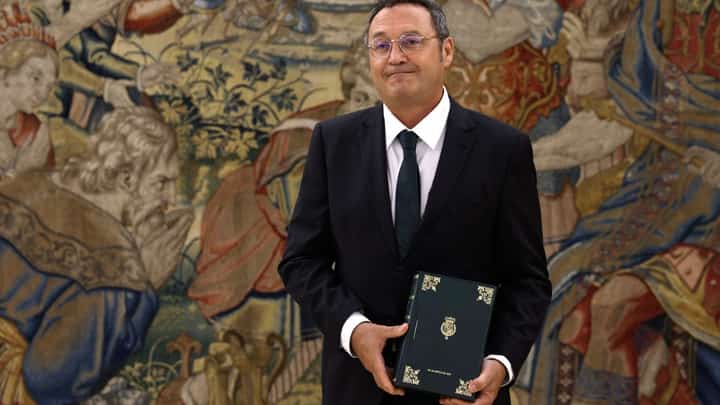 (FILES) Spain's Attonery General Alvaro Garcia Ortiz holds the Annual Report of the Attorney General’s Office prior to presenting it to the king on September 3, 2025 at La Zarzuela Palace in Madrid. The Spanish Supreme Court imposed a €150,000 bail on Attorney General Alvaro Garcia Ortiz September 9, 2025 and formally confirmed that he will stand trial for alleged violation of judicial secrecy, in an awkward case for the government of Socialist Pedro Sánchez, who appointed him.