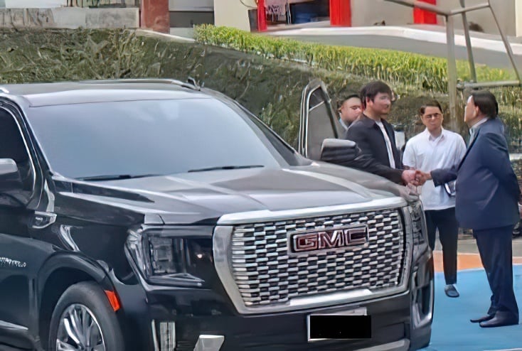 Angling for approval Former Department of Public Works and Highways Bulacan 1st District Assistant Engineer Brice Ericson Hernandez surrenders a luxury vehicle to the Independent Commission for Infrastructure in Bonifacio Global City, Taguig, on 19 September.