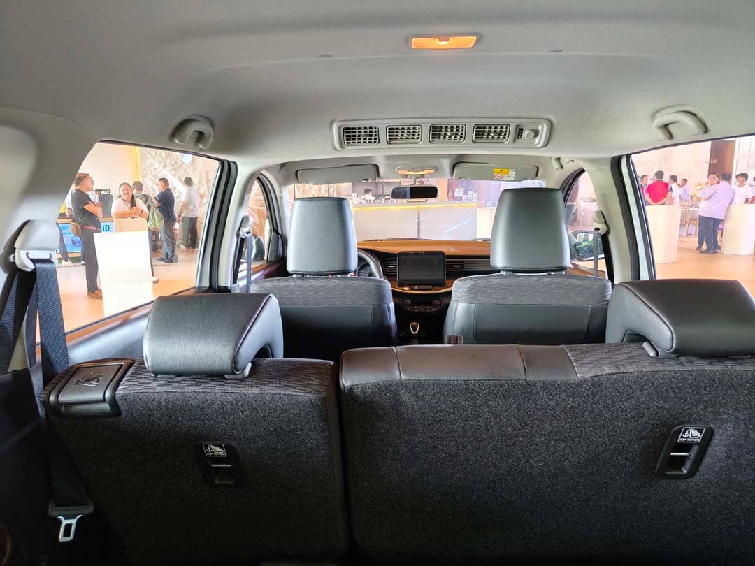REAR cabin view highlights the three-row seating configuration.