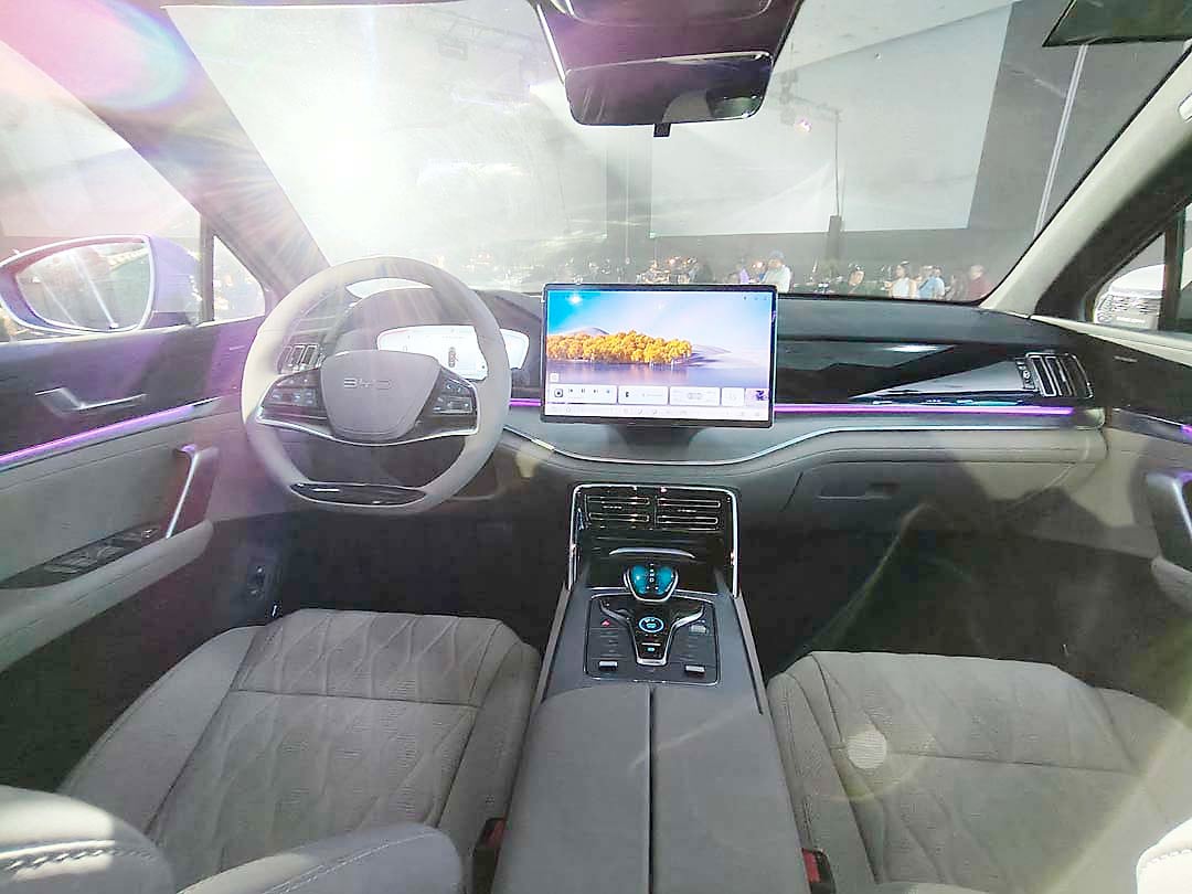 INSIDE the driver’s view of the Tang DM-i with its digital screen and ambient lighting.