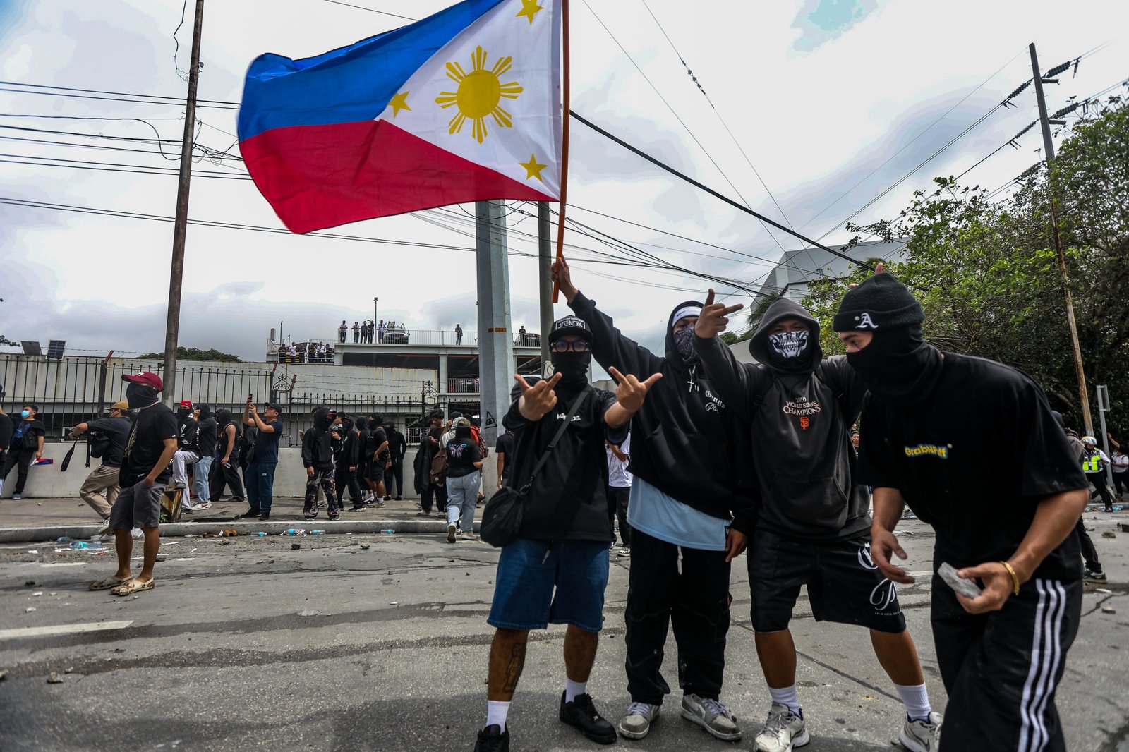IN PHOTOS: Various progressive groups from different sectors marched down from the pilot rally area in Luneta to Mendiola Peace Arch to protest the irregularities and anomalies in governance on Sunday, 21 September, 2025.  Tensions that turned into a violent dispersal follows as a truck container and police barricade restricted protesters from crossing Ayala Bridge that caused the truck and a motorcycle to be set on fire. 

In Mendiola, a series of stampedes, tear gas explosions, and riot with the police were also seen till night as protesters threw solid objects to resist with the police barricade. Disrupting sounds were also heard playing through the city's speakers. 

Some attendees involved in the protest were arrested by authorities.|Aram Lascano