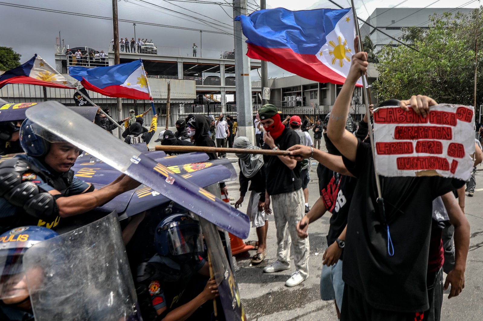 IN PHOTOS: Various progressive groups from different sectors marched down from the pilot rally area in Luneta to Mendiola Peace Arch to protest the irregularities and anomalies in governance on Sunday, 21 September, 2025.  Tensions that turned into a violent dispersal follows as a truck container and police barricade restricted protesters from crossing Ayala Bridge that caused the truck and a motorcycle to be set on fire. 

In Mendiola, a series of stampedes, tear gas explosions, and riot with the police were also seen till night as protesters threw solid objects to resist with the police barricade. Disrupting sounds were also heard playing through the city's speakers. 

Some attendees involved in the protest were arrested by authorities.|Aram Lascano