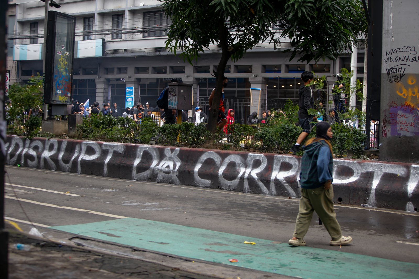 IN PHOTOS: Various progressive groups from different sectors marched down from the pilot rally area in Luneta to Mendiola Peace Arch to protest the irregularities and anomalies in governance on Sunday, 21 September, 2025.  Tensions that turned into a violent dispersal follows as a truck container and police barricade restricted protesters from crossing Ayala Bridge that caused the truck and a motorcycle to be set on fire. 

In Mendiola, a series of stampedes, tear gas explosions, and riot with the police were also seen till night as protesters threw solid objects to resist with the police barricade. Disrupting sounds were also heard playing through the city's speakers. 

Some attendees involved in the protest were arrested by authorities.|Aram Lascano