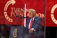 Trump praises conservative 'giant' Kirk at mega memorial event
