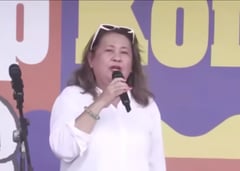 Tessie Tomas urges government resignation at rally