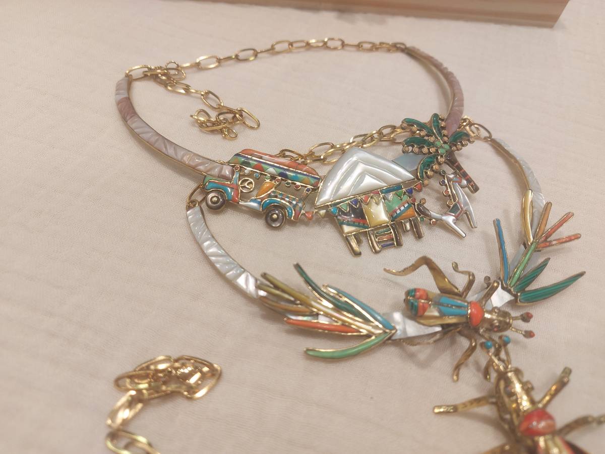 JEEPNEY and bahay kubo necklace.