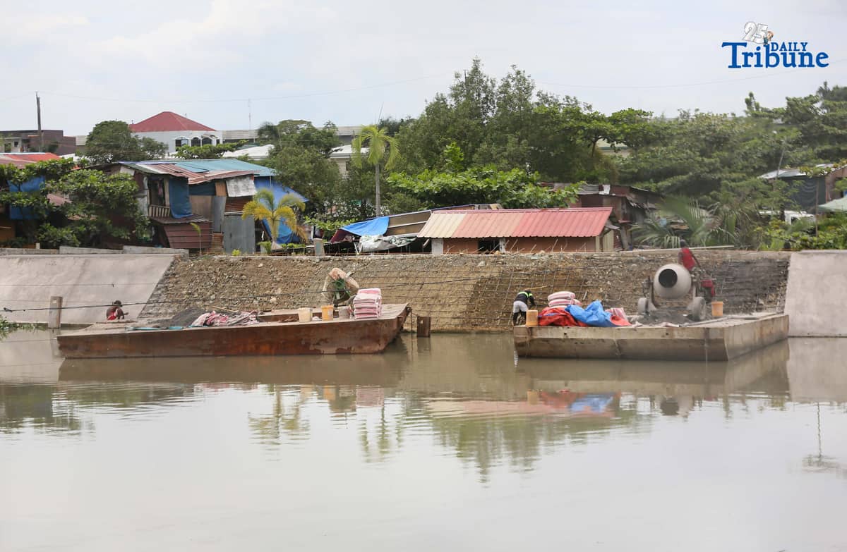 (September 23 2025) Workers from the contractors of Department of Public Works and Highways (DPWH) Bulacan 1st District Engineering Office (DEO) were seen busy working the concrete laying on the riverbank protection structure along a river at Barangay Santa Cruz in Guiguinto, Bulacan on Friday September 19 2025. At the senate hearing held on Tuesday September 23 2025, former assistant district engineer Brice Hernandez said, From at least 2019 to 2025, or for the last six years, all Department of Public Works and Highways (DPWH) projects in the first district of Bulacan have been substandard, or at the very least “under-designed,” Photo/Analy Labor