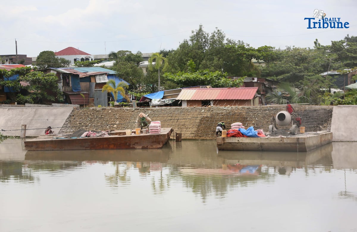 (September 23 2025) Workers from the contractors of Department of Public Works and Highways (DPWH) Bulacan 1st District Engineering Office (DEO) were seen busy working the concrete laying on the riverbank protection structure along a river at Barangay Santa Cruz in Guiguinto, Bulacan on Friday September 19 2025. At the senate hearing held on Tuesday September 23 2025, former assistant district engineer Brice Hernandez said, From at least 2019 to 2025, or for the last six years, all Department of Public Works and Highways (DPWH) projects in the first district of Bulacan have been substandard, or at the very least “under-designed,” Photo/Analy Labor