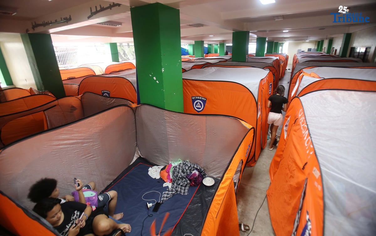 (September 23 2025) Families resident near the creek at Roxas District in Quezon City sought temporary shelter at the Roxas District Evacuation Center in Quezon City on Tuesday, September 23, 2025, following the Quezon City government’s order for pre-emptive evacuation in flood-prone areas due to Super Typhoon “Nando.” Photo/Analy Labor